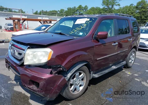 2009 Honda Pilot Touring z USA, uszkodzony, nr VIN 5FNYF48989B046752